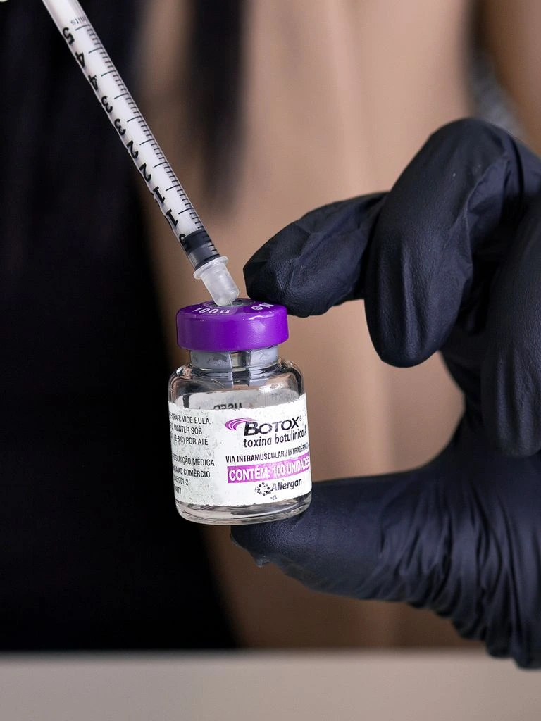 Single clinical vial on a neutral backdrop